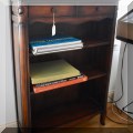 F23. Wooden bookcase with two top drawers. 46"h x 32"w x 12"d 